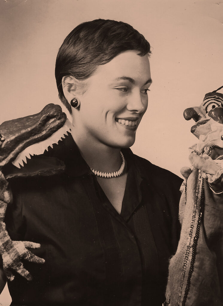 Figure 1. Nancy Lohman Staub with Punchinello Puppets in 1956. (Photo: 