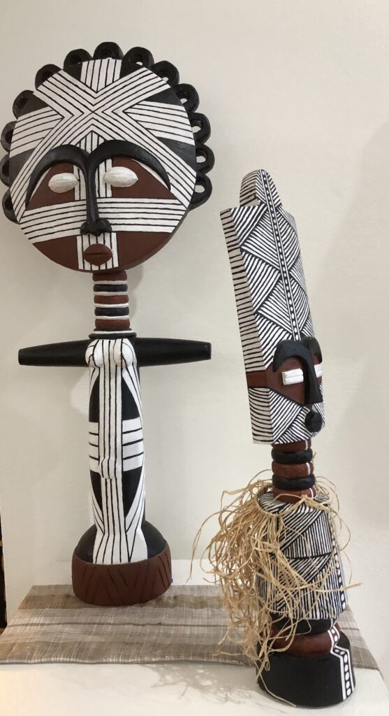 Figure 1. Akuaba dolls by Cynthia Sands with carving by Awuda. (Photo: Kathy Foley)