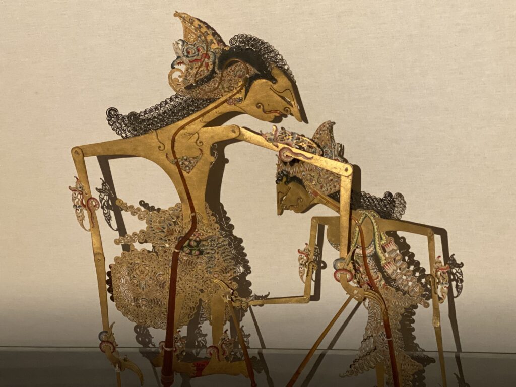 Figure 3.  A wayang scene in which Abimanyu comforts his fiancee, seen from the dalang’s point of view. (Photo: Ron Jenkins)