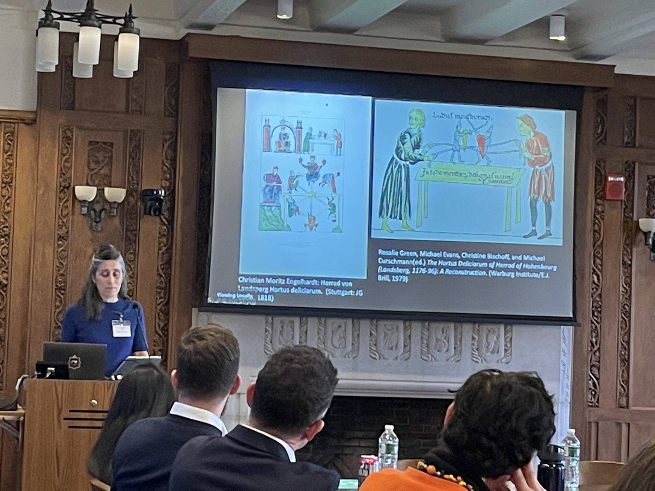 Figure 3. Alexa Sand presents “Dismembered Memories: Puppets, Bodies, Laughter, and Violence in the Late Middle Ages.” (Photo: Claudia Orenstein)